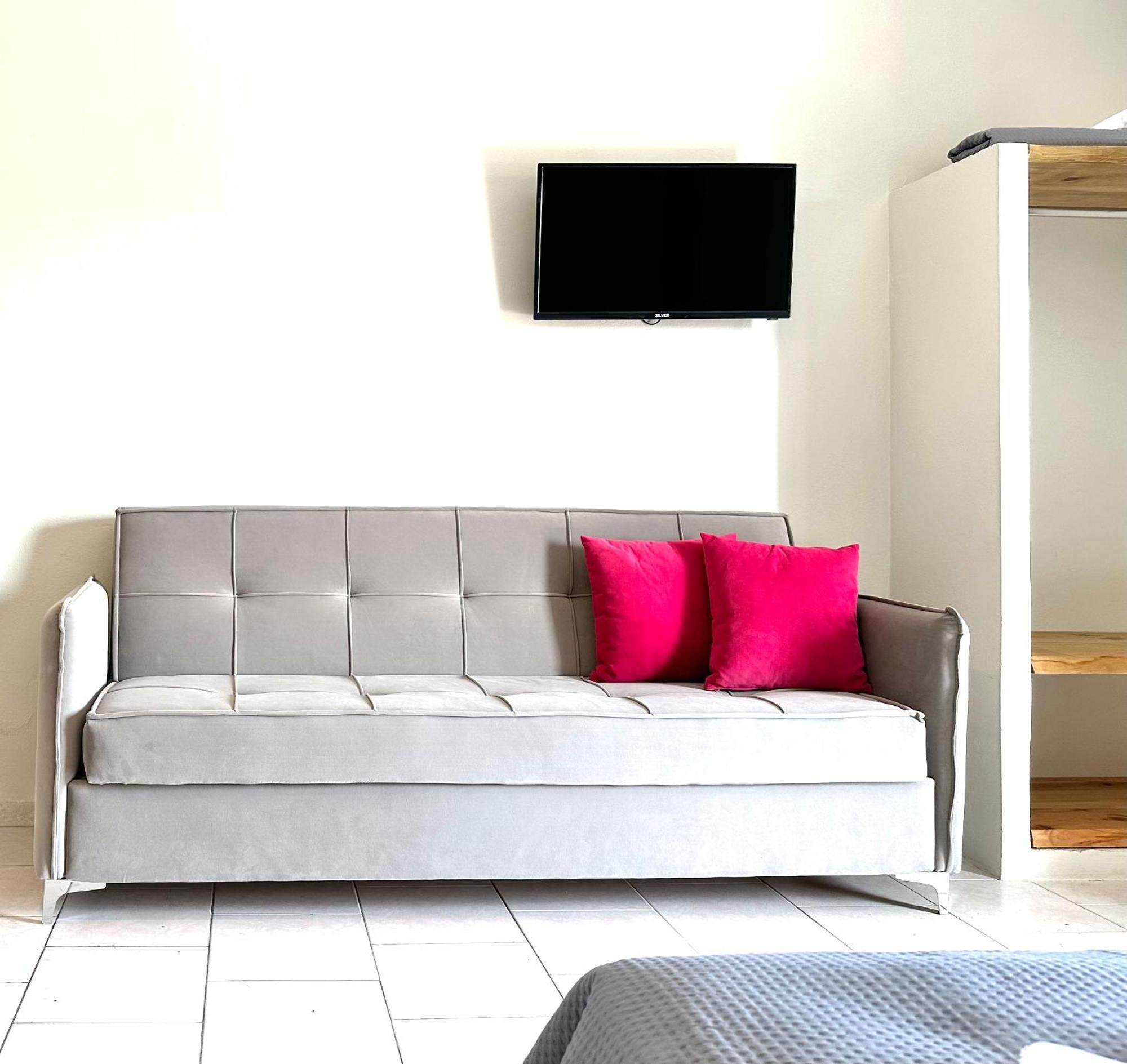 Dreibettzimmer mit Gartenblick